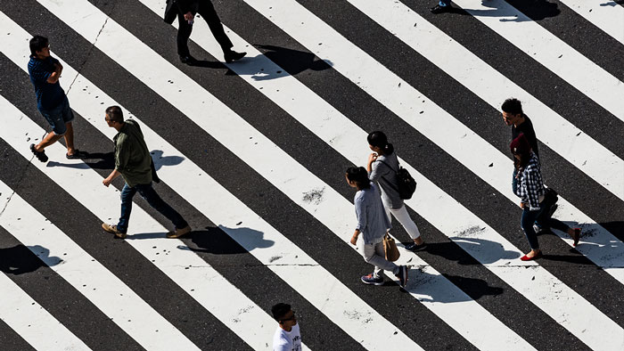People Walking on Crossroad