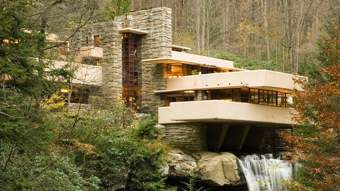 A photography of Falling Water House designed by Frank Lloyd Wright